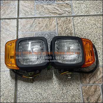 Đèn pha xúc lật XCMG LW180FV – Sáng mạnh, bền bỉ, lắp chuẩn xe